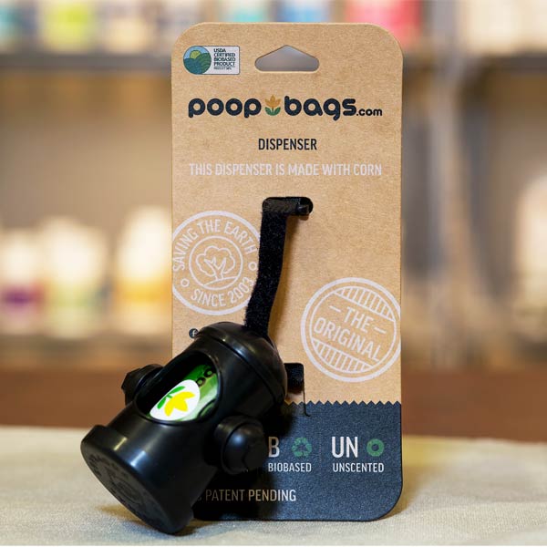 PoopBags Hydrant Dispenser in use