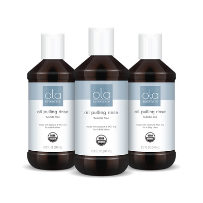 Ola Botanicals Organic Oil Pulling Rinse bottle
