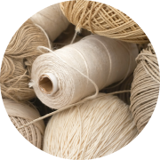 Long-staple cotton fibers spun into yarn and woven into fabric