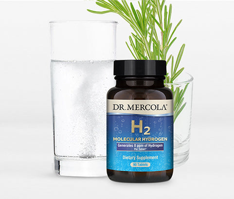Dr. Mercola H2 Molecular Hydrogen, 90 tablets, beside a glass of water and fresh rosemary.